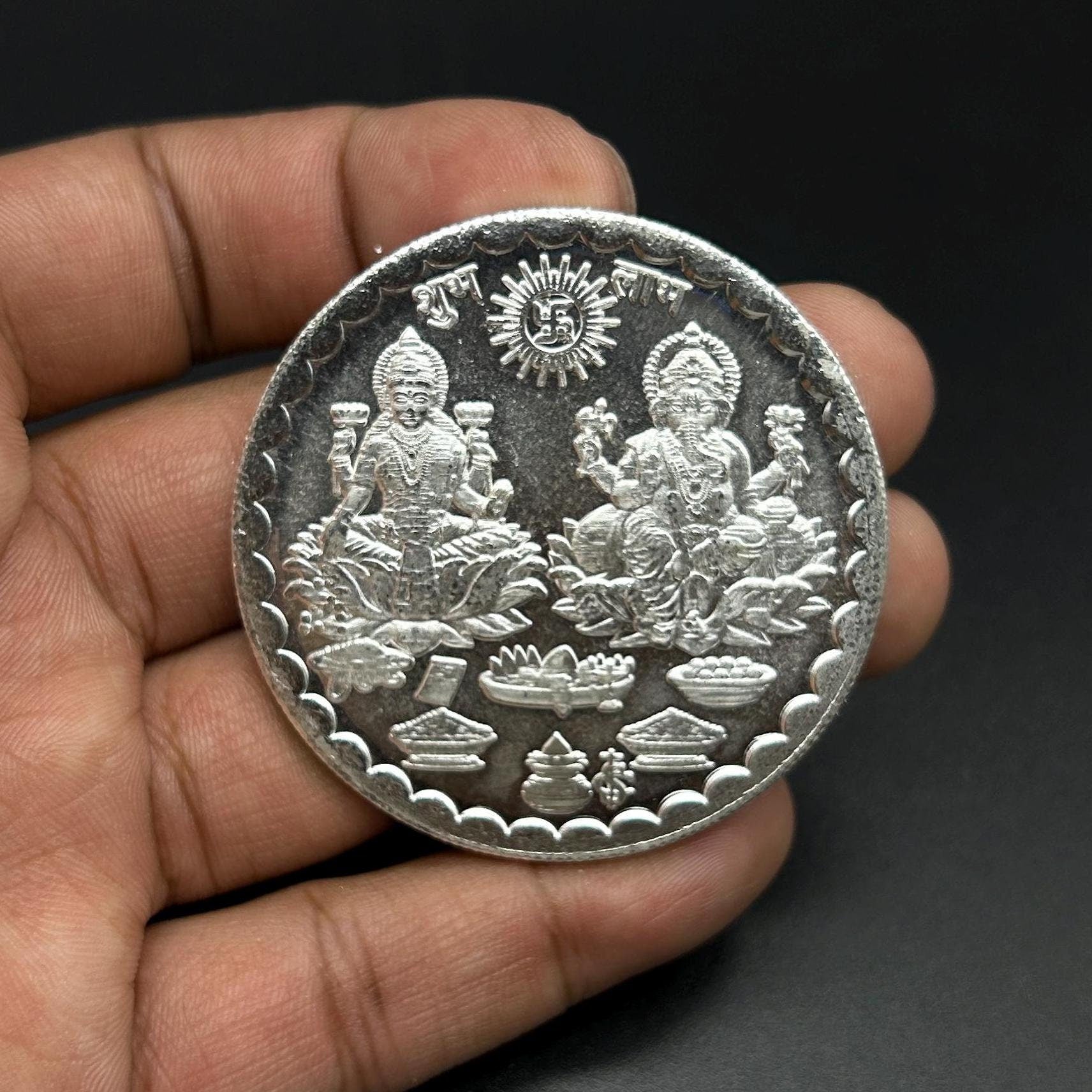 99.90% Pure Silver 50grams Laxmi Ganesh Silver Coin By Sarafa Traders Commity